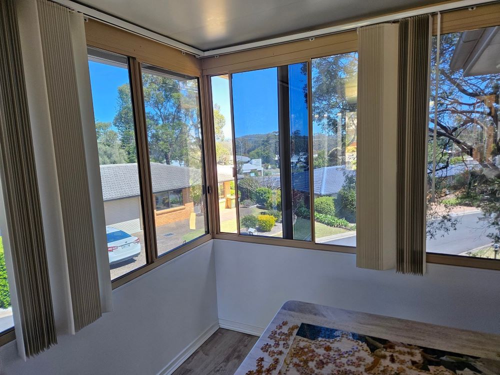 A Room With Tinted Windows and a Rug on the Floor — PJ Tinting In Port Macquarie, NSW