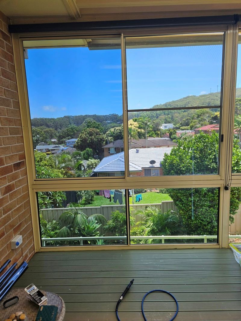 A Room With a Large Window and a View of a City — PJ Tinting In Port Macquarie, NSW