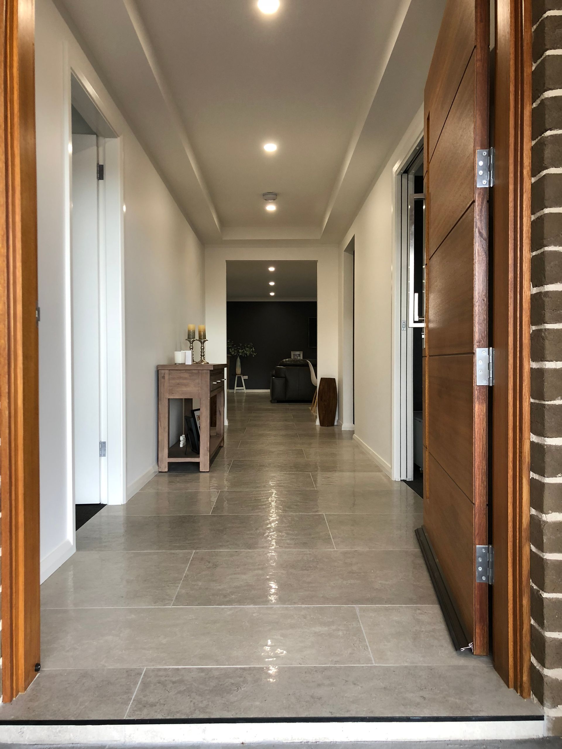 A Deck With Beige Tiles On The Floor — Beckers Tiling in Bathurst, NSW