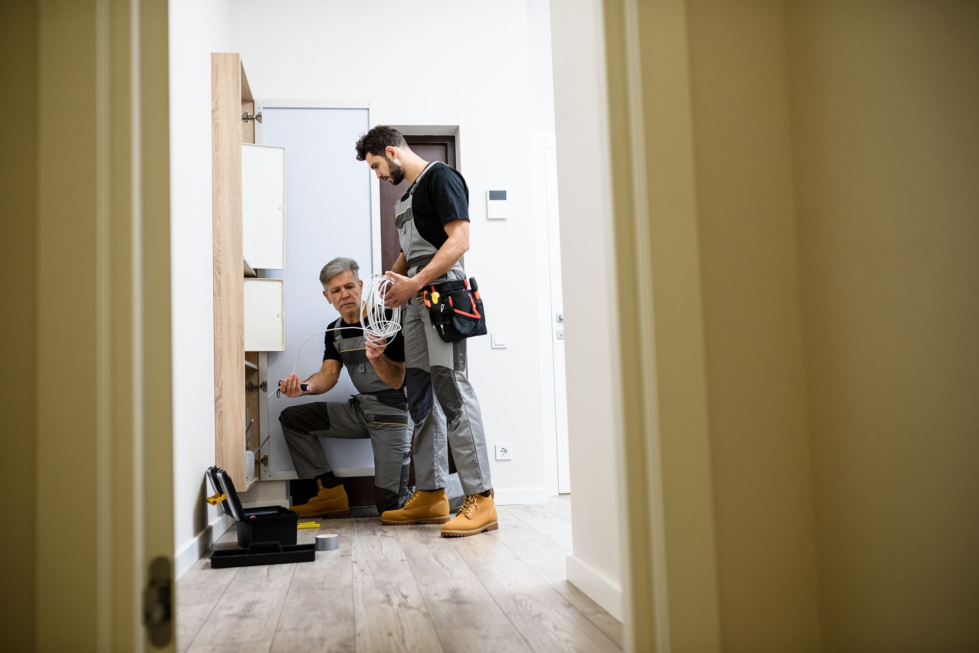 Handymen working indoors Handymen working indoors