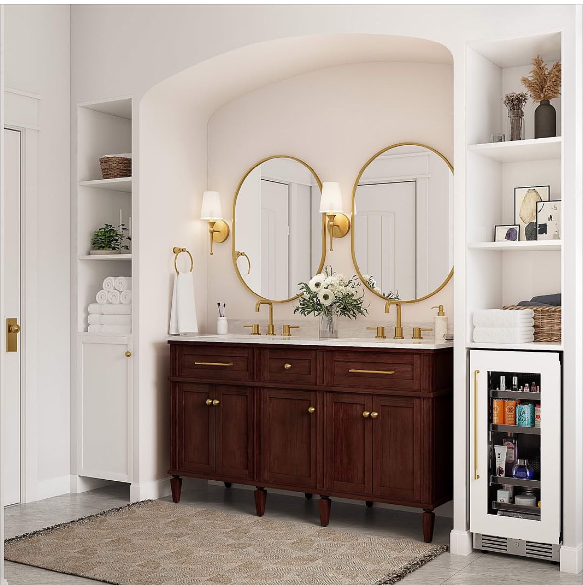 Elegant bathroom vanity with dark wood cabinet, gold mirrors, wall sconces, and white built-in shelves