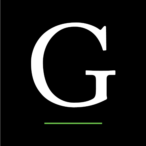 A white letter g on a black background with a green line.