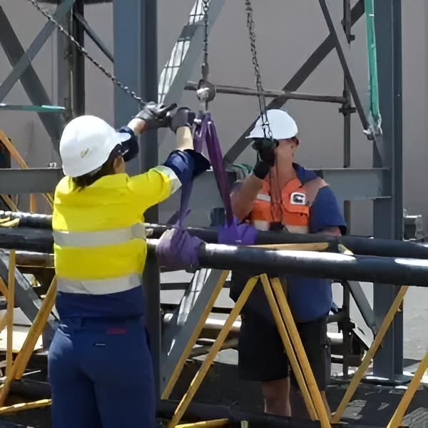 A Man Wearing a Vest With the Letter G on It — Advanced Industry Training In South Townsville, QLD