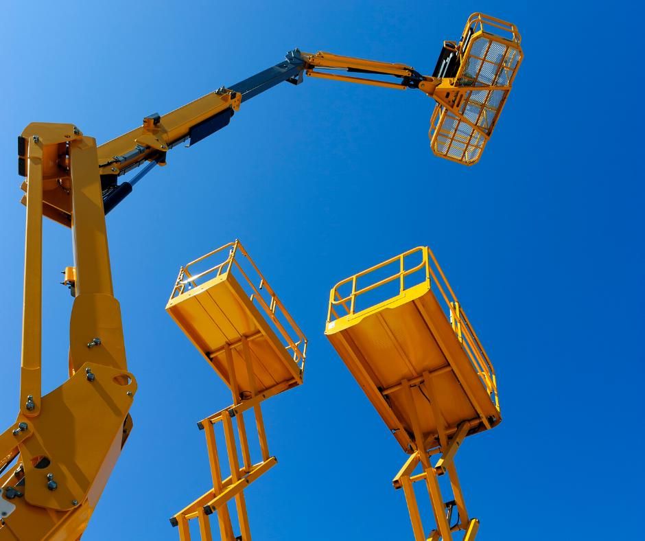 A Yellow Crane With a Blue Sky in the Background — Advanced Industry Training In South Townsville, QLD
