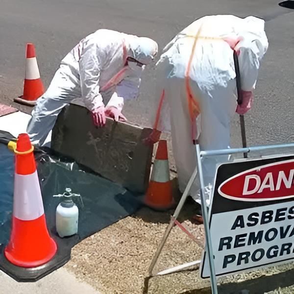 A Sign That Says Danger Asbestos Removal Program — Advanced Industry Training In South Townsville, QLD