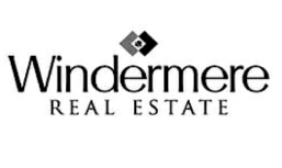 The windermere real estate logo is black and white
