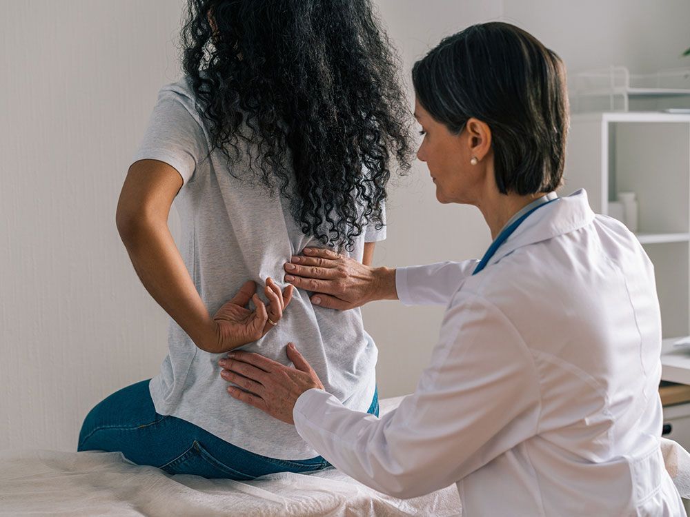 Checking Patient's Back — Sterling Heights, MI — Intracare Surgery Center Checking Patient's Back — Sterling Heights, MI — Intracare Surgery Center