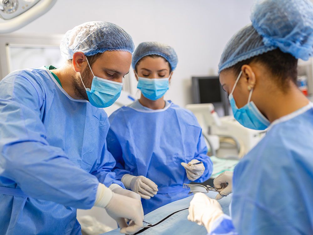 Medical Team Doing Surgery — Sterling Heights, MI — Intracare Surgery Center Medical Team Doing Surgery — Sterling Heights, MI — Intracare Surgery Center