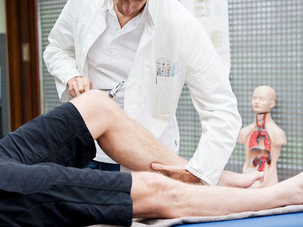 Testing Patellar Tendon's Reflex — Sterling Heights, MI — Intracare Surgery Center Checking Child Patient — Sterling Heights, MI — Intracare Surgery Center