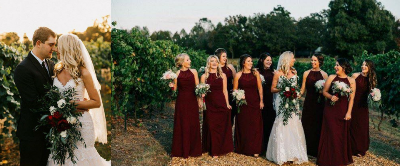 Outdoor wedding couple kissing; bridal party in burgundy dresses and suits stands beside them