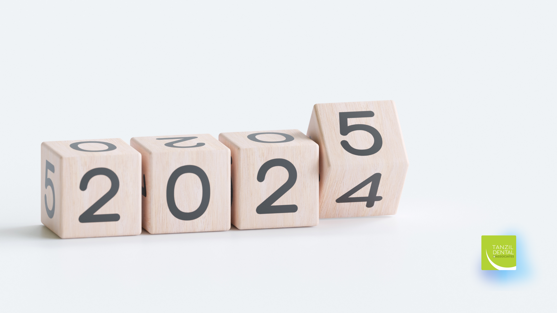 A row of wooden blocks with the numbers 2022 and 2024 on them
