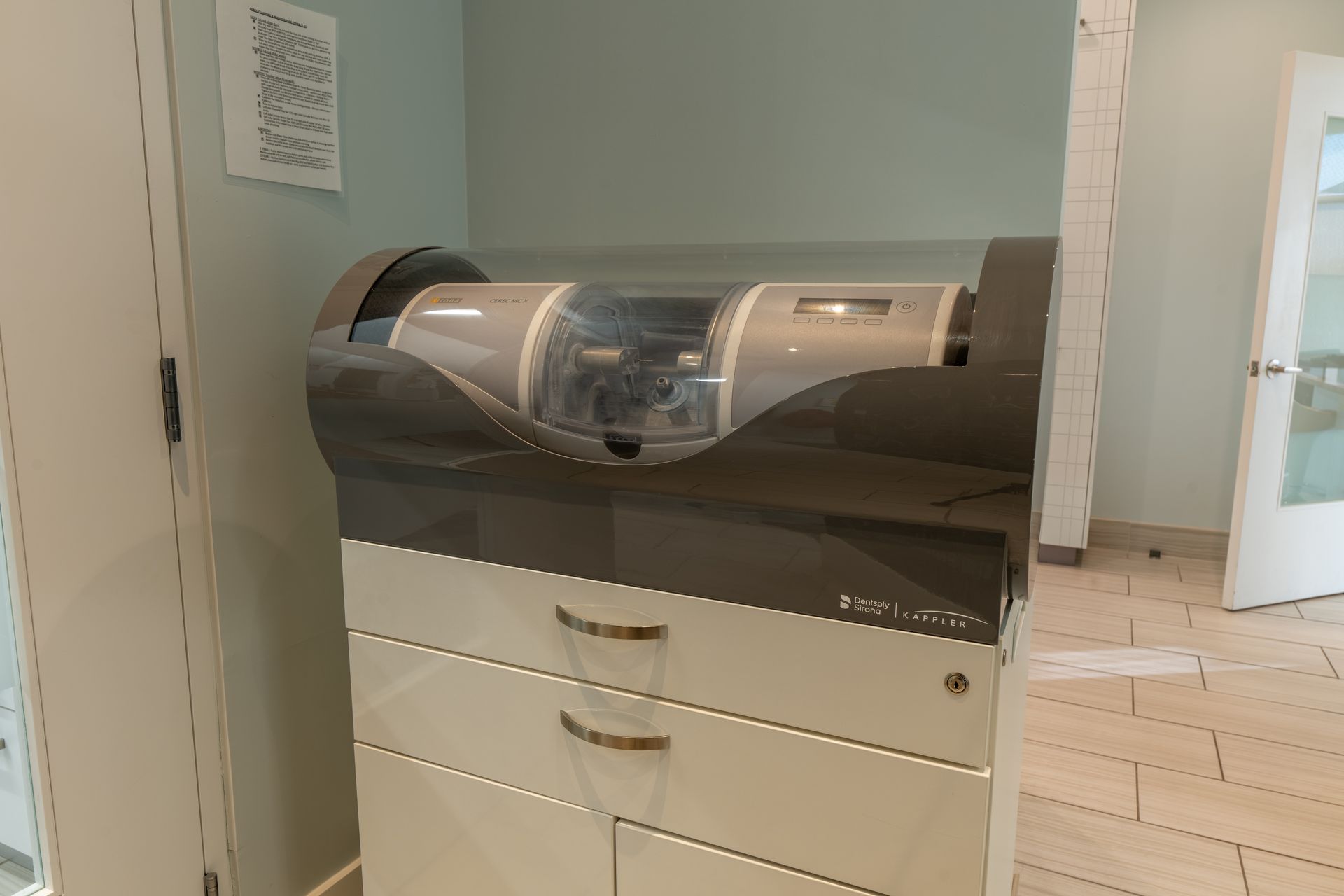 Dental milling machine in an office setting.