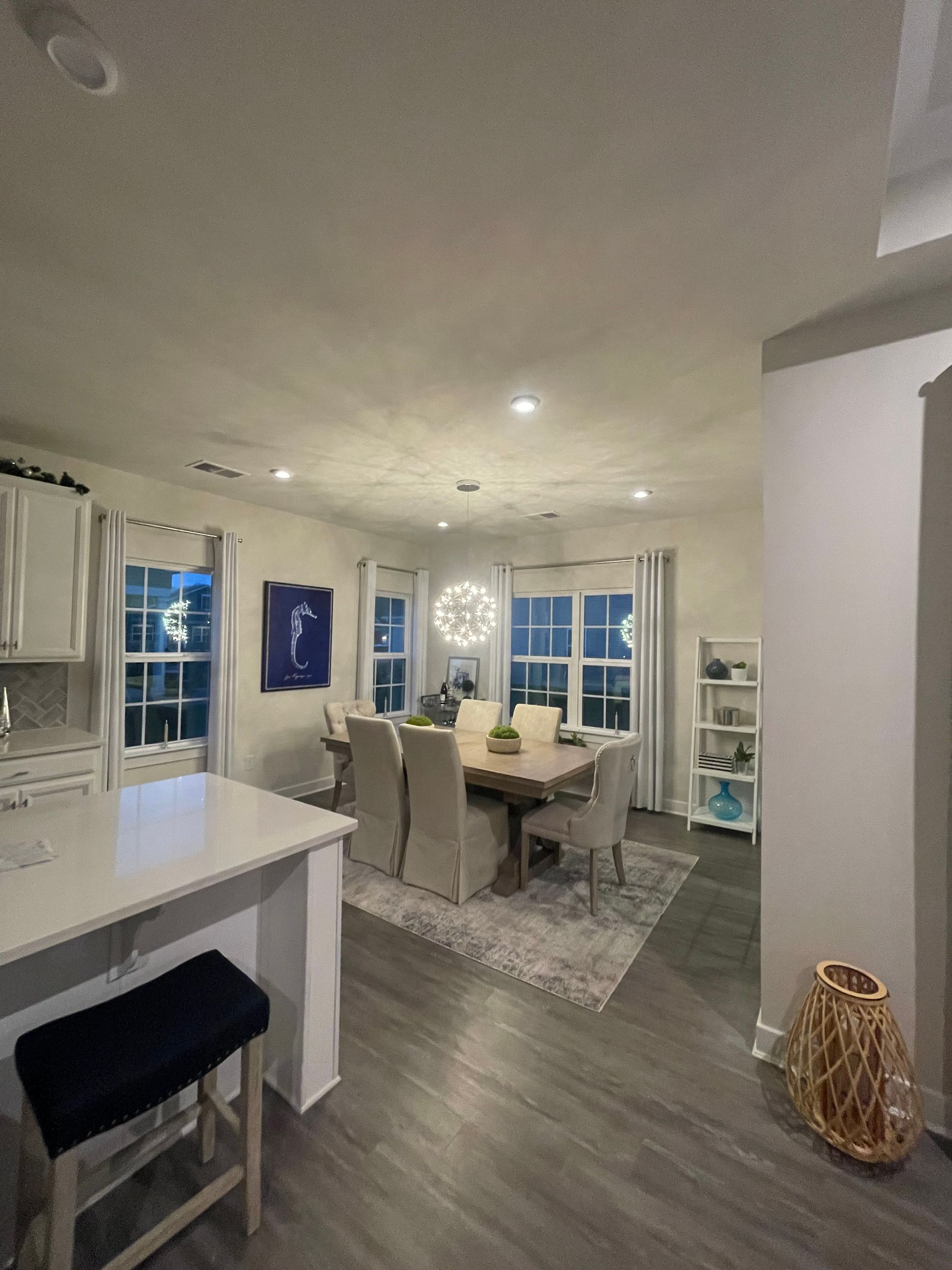 Dining room recessed and pendant lighting after complete home electrical installation
