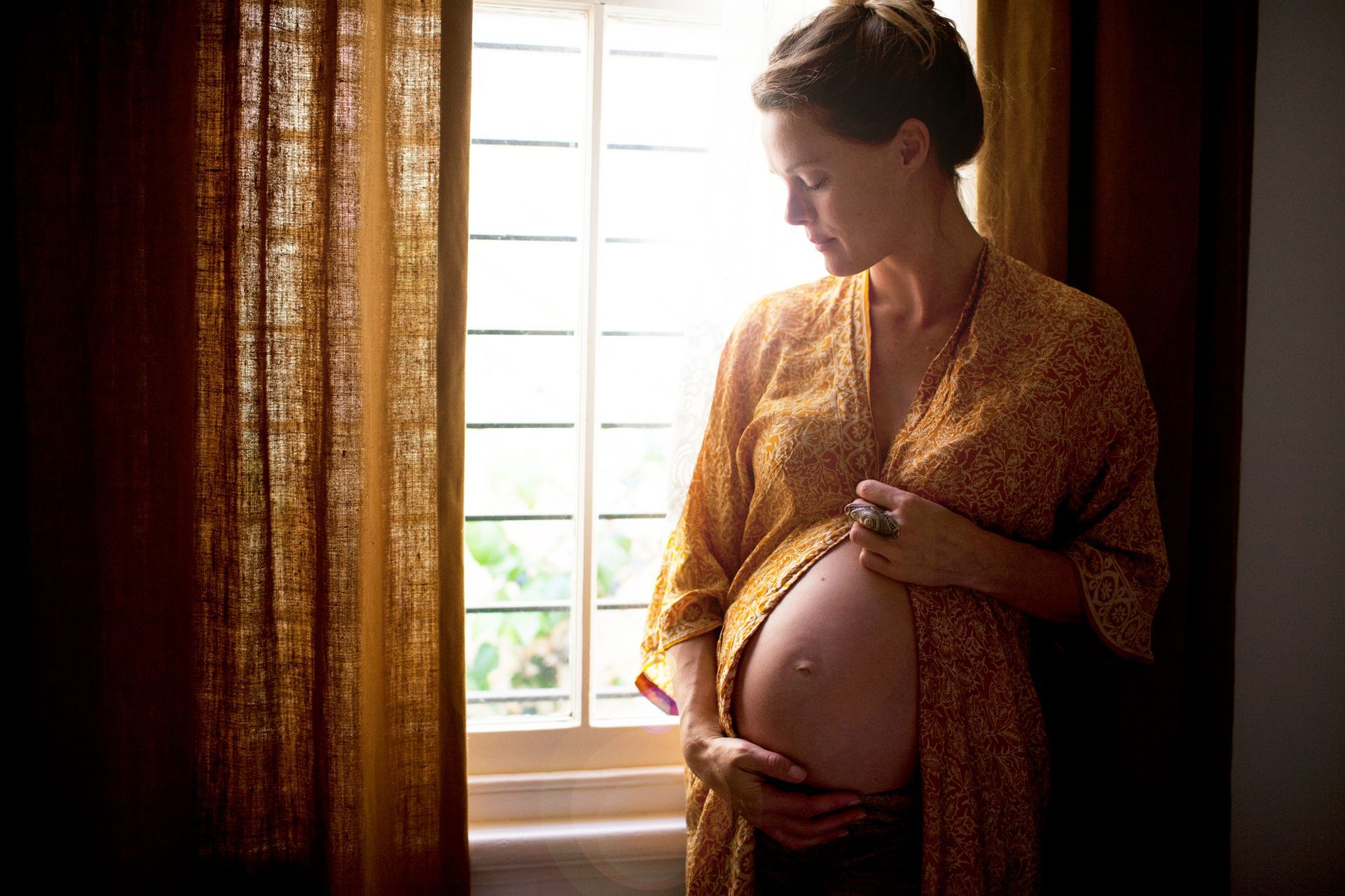 Pregnant Women On Window — Bruce ACT — Dr. Sim Hom Tam