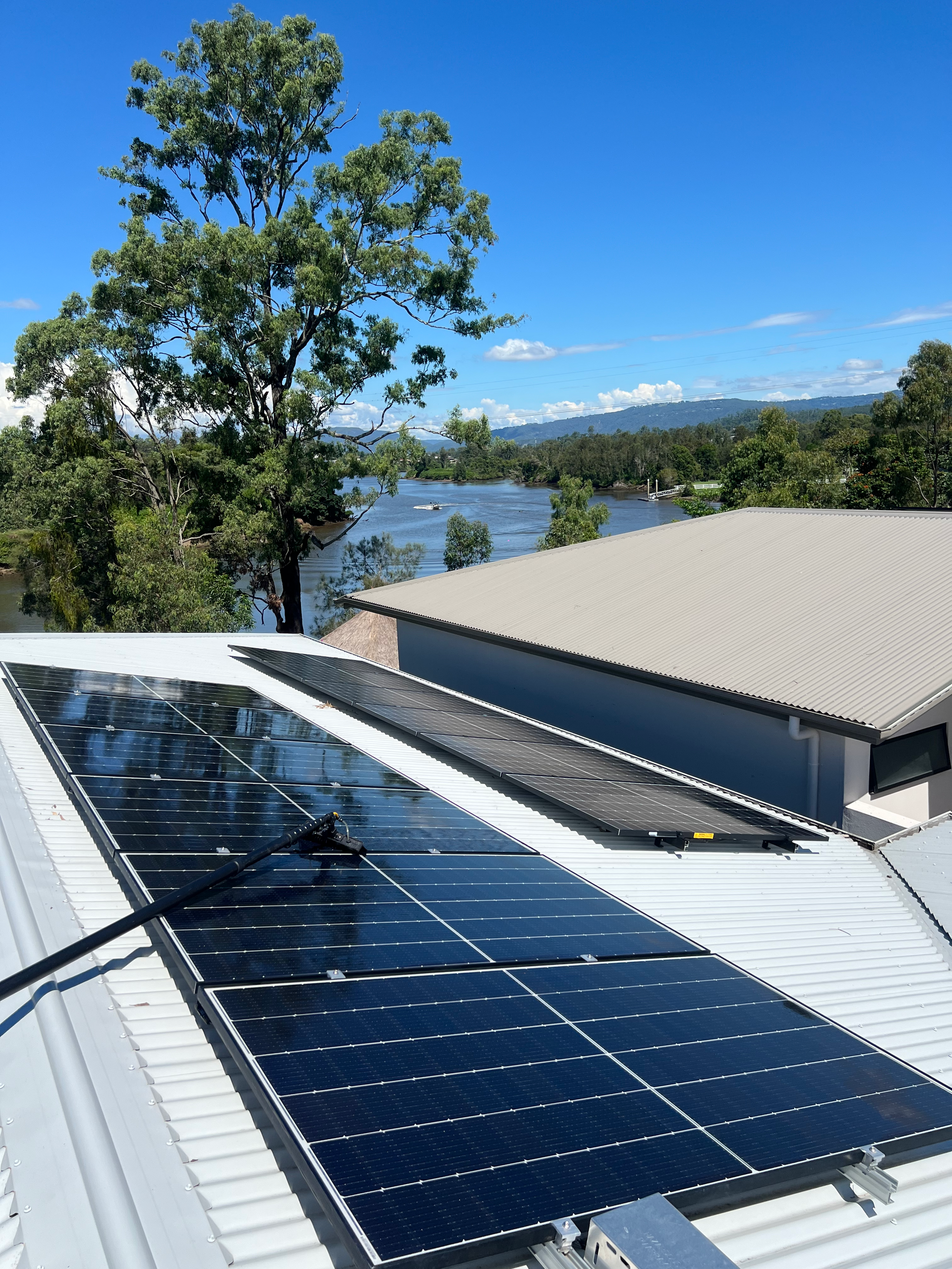 A House With Solar Panels On The Roof — Supercare Gold Coast in Miami, QLD