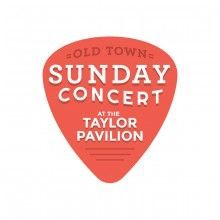 Red guitar pick sign for Old Town Sunday Concert at the Taylor Pavilion in white and coral