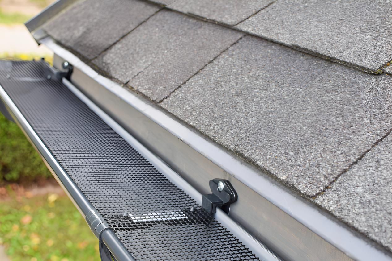 A Close up Of a Gutter on The Roof of A House — All-Clear Gutter Guard NQ in Cairns, QLD