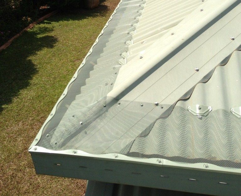 A Close up Of a Roof with A Gutter on It — All-Clear Gutter Guard NQ in Cairns, QLD