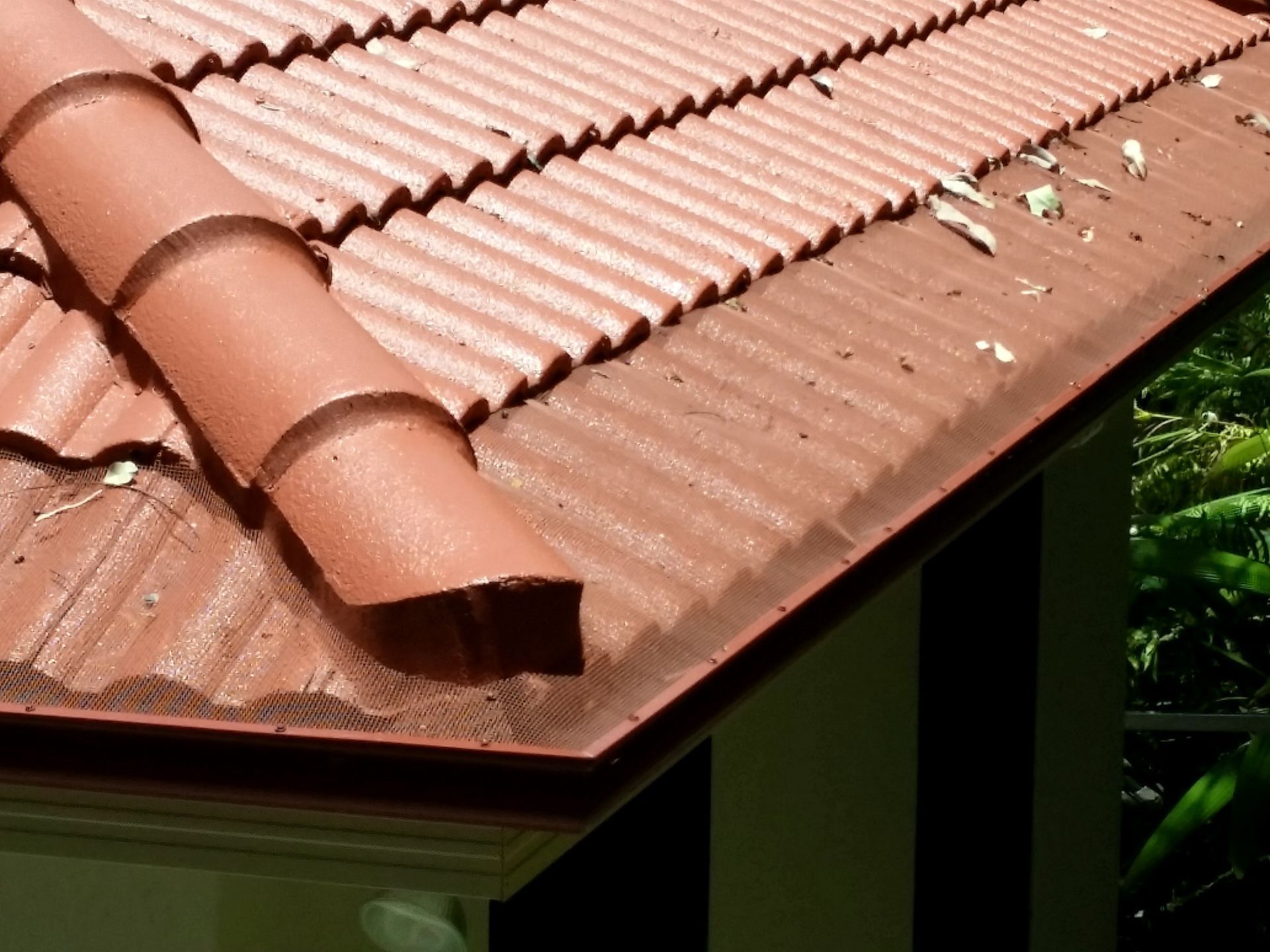 A Close up Of a Roof with A Gutter on It — All-Clear Gutter Guard NQ in Cairns, QLD