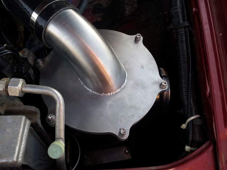 Close Up Of A Metal Pipe In A Car Engine — Vids Fabrication in South Lismore, NSW 