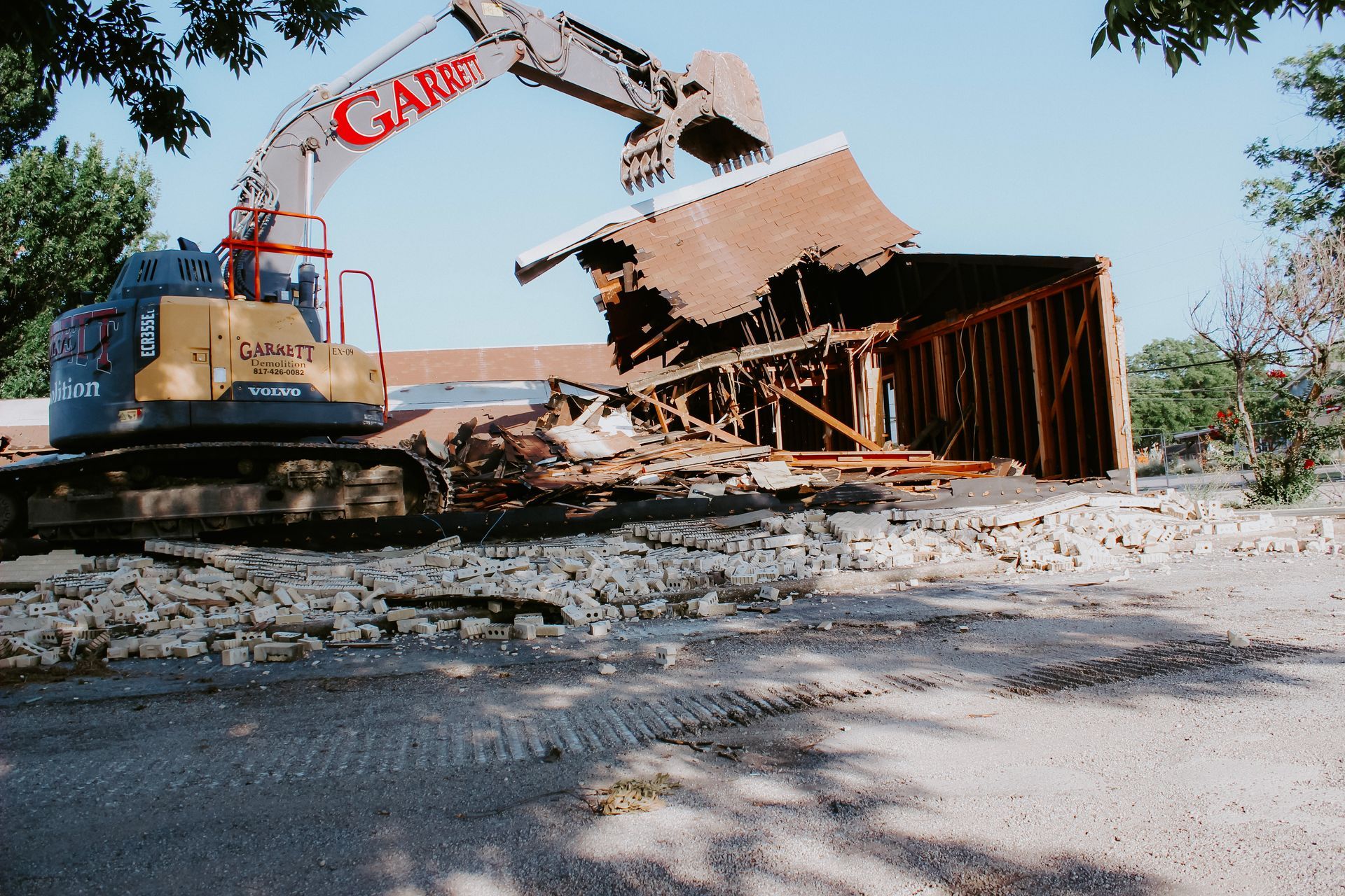 A large yellow excavator with the word ga on it