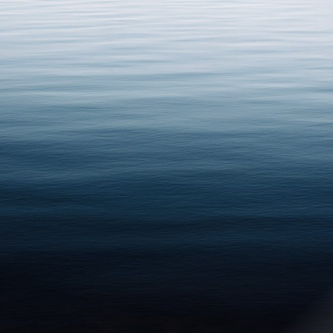 Ocean water, shades of blue, gradient from light to dark.