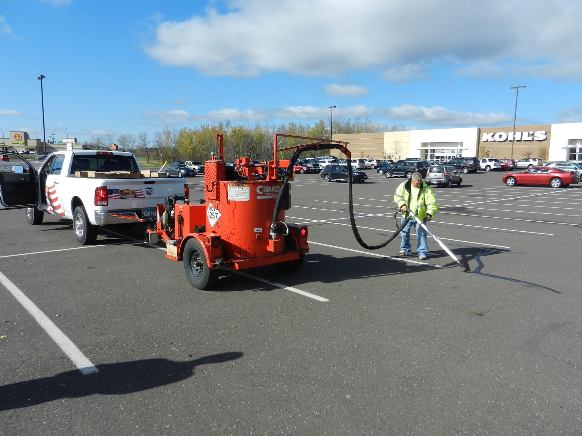 parking lot crack filling - Maple Grove, MN - LADC Companies