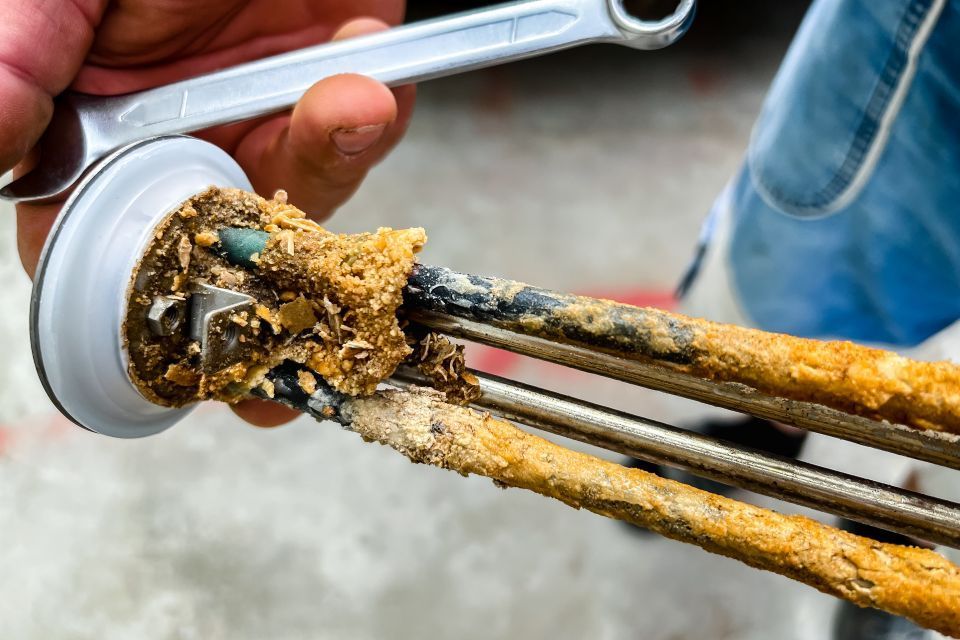 sediment buildup hot water system