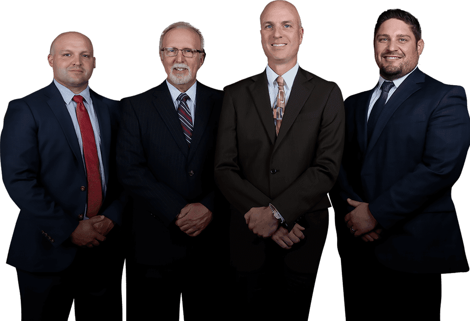 Four businessmen in suits and ties, posing formally.