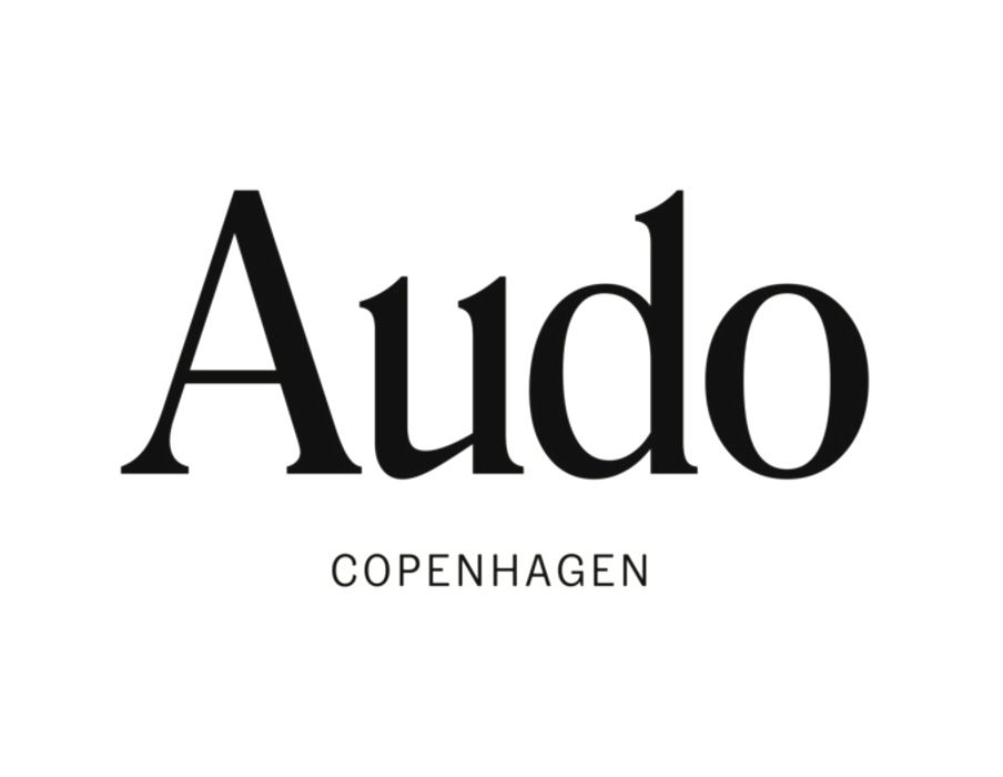 Een zwart-wit logo voor audo copenhagen op een witte achtergrond.