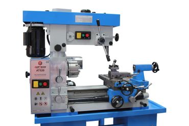 Blue and gray metal lathe milling machine in a workshop, shown on a white background