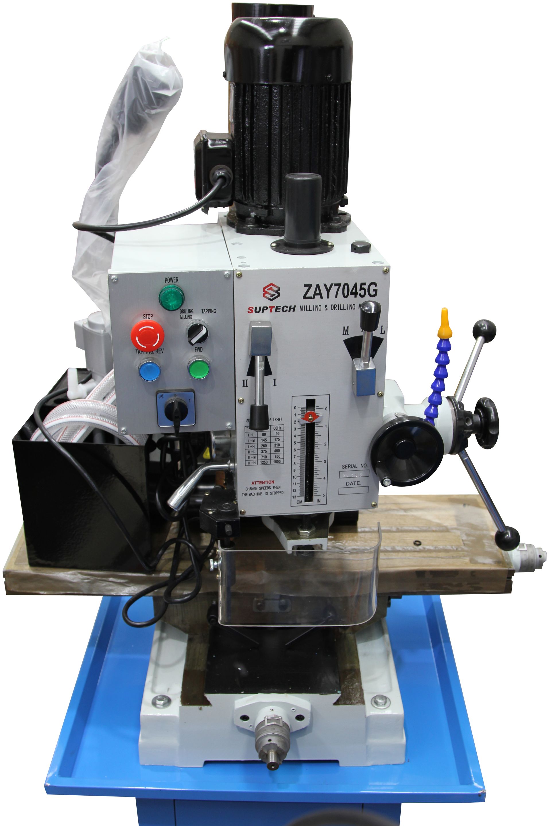 Compact industrial milling machine with blue base, gray body, black motor, and control buttons on a wooden pallet