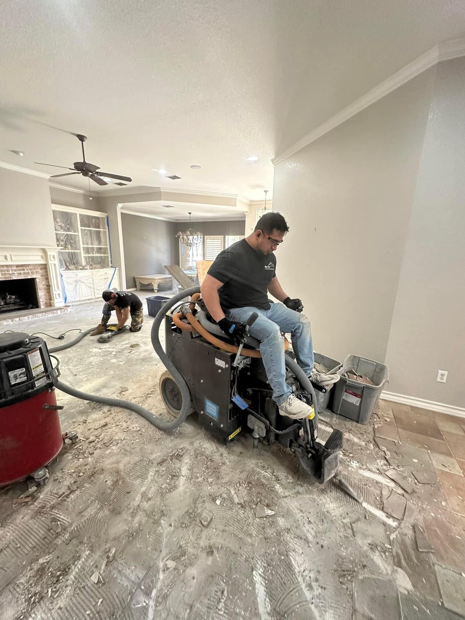 Tile and thinset removal using a ride on floor scraper