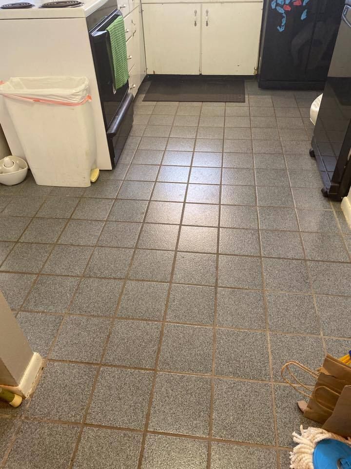 This is a image of dirty tile and grout before cleaning and color sealing grout.