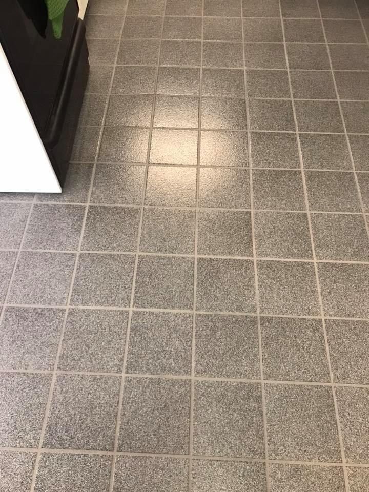 This is a after photo of tile and grout after cleaning and color sealing grout.