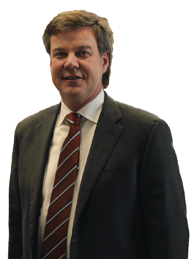 MiltonSmith A man in a suit and tie stands in front of a white background
