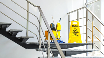 Cleaning materials on stairs in business