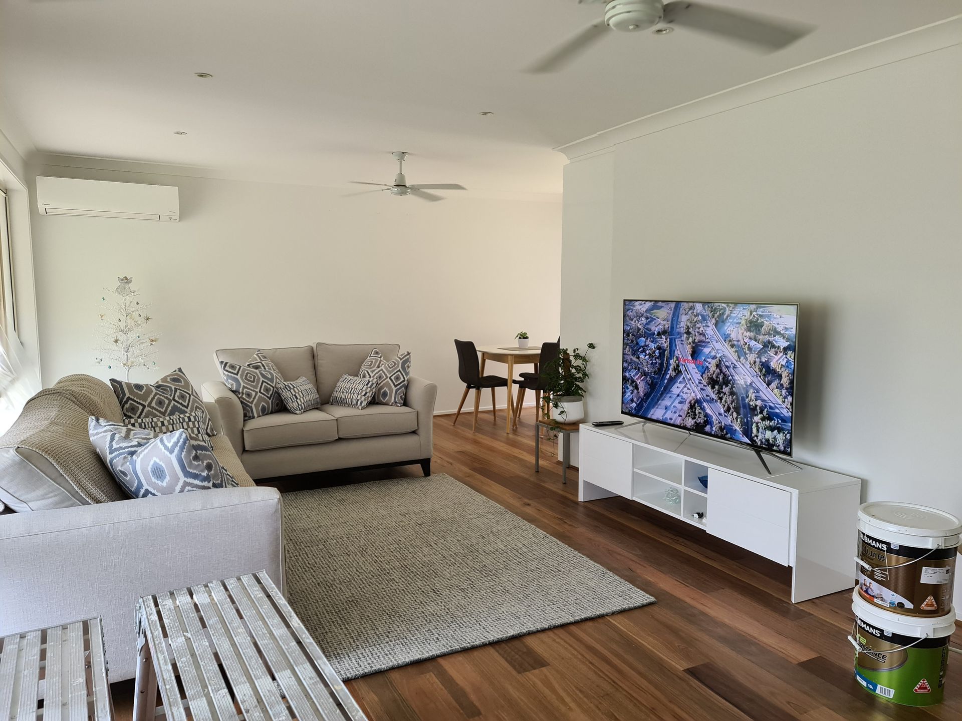 A Kitchen Under Construction With a Ladder and Stairs — JAX Painting Services in Central Coast, NSW