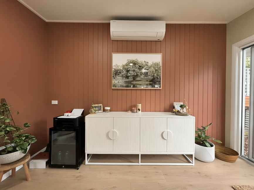 A Bedroom With a Bed and a Ceiling Fan — JAX Painting Services in Central Coast, NSW