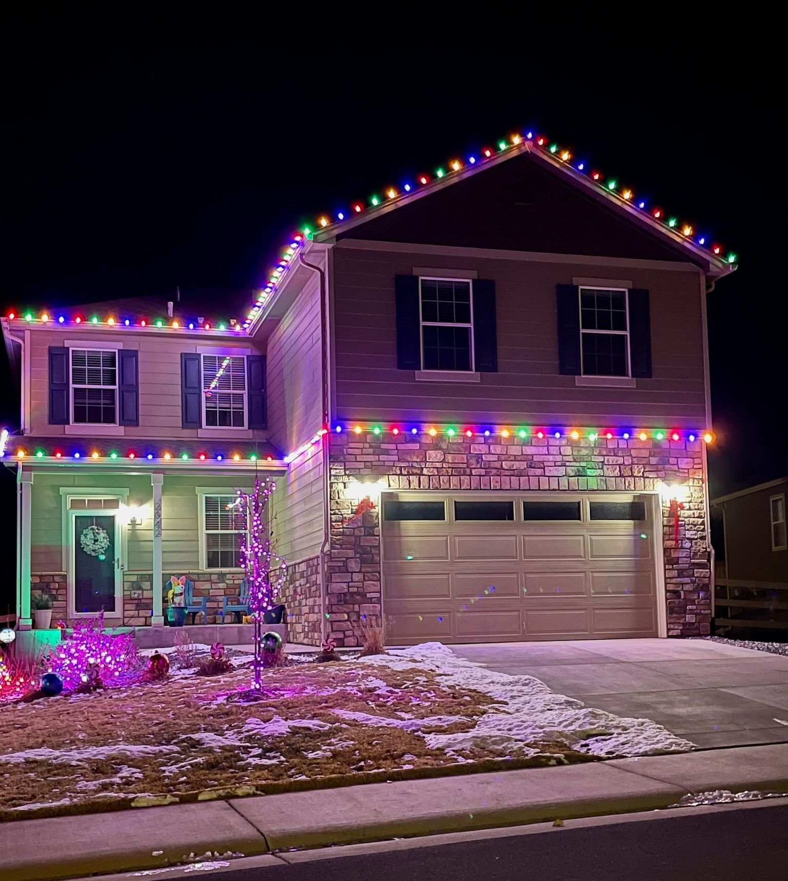 Professional holiday lighting on house