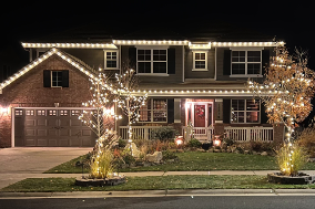 Professional holiday lighting on home