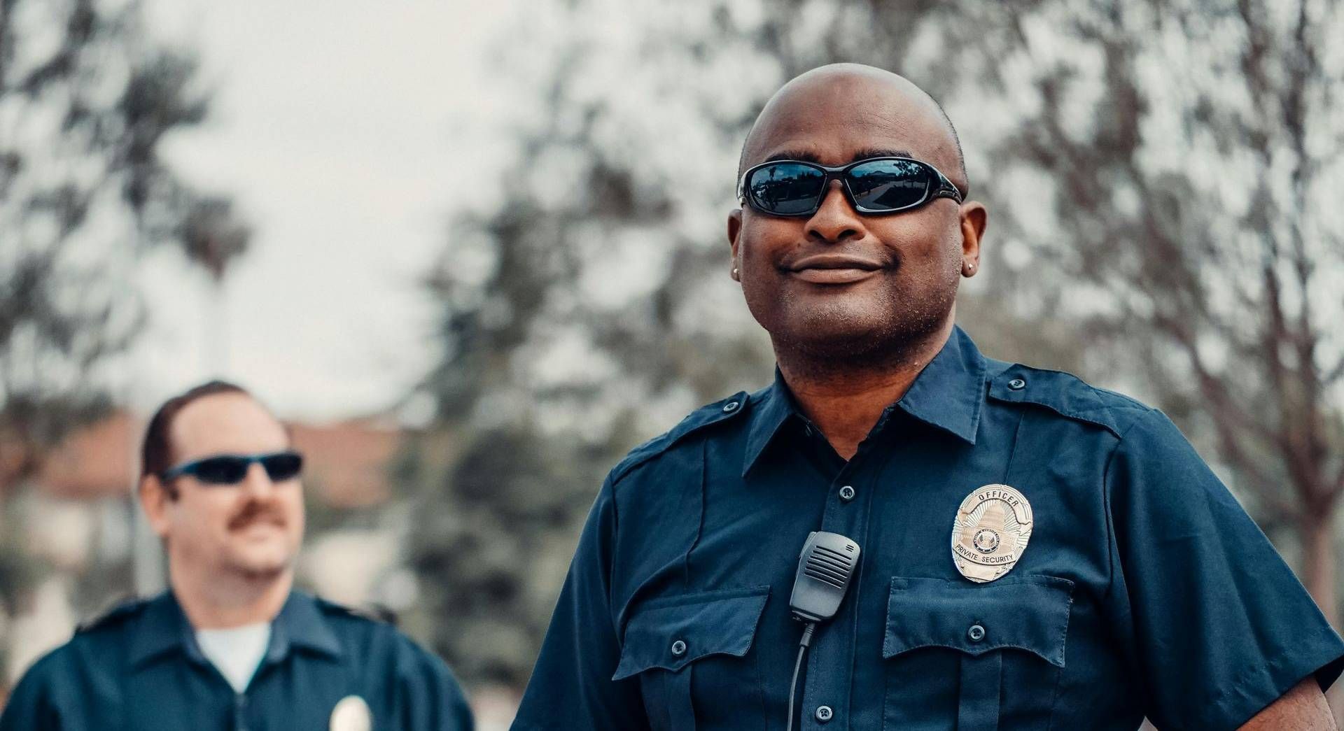 Police officers providing security and traffic control for a funeral in Utah County