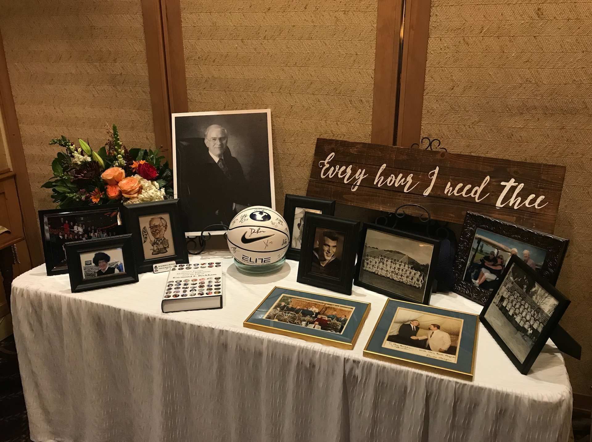 Memorial display with photos and keepsakes at a viewing and visitation