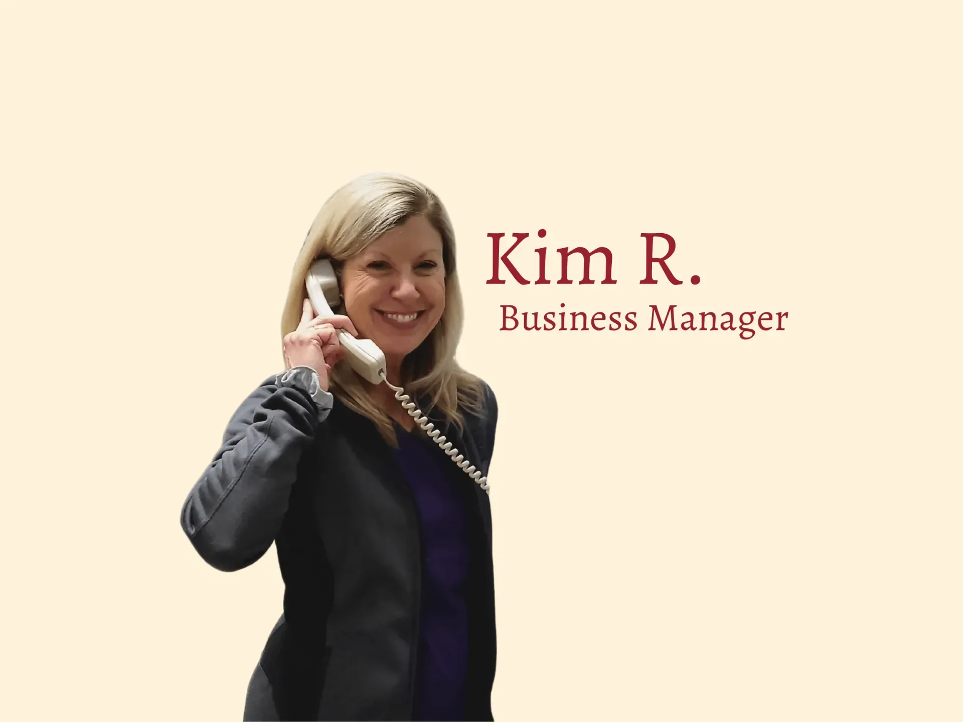 Woman on phone, smiling.