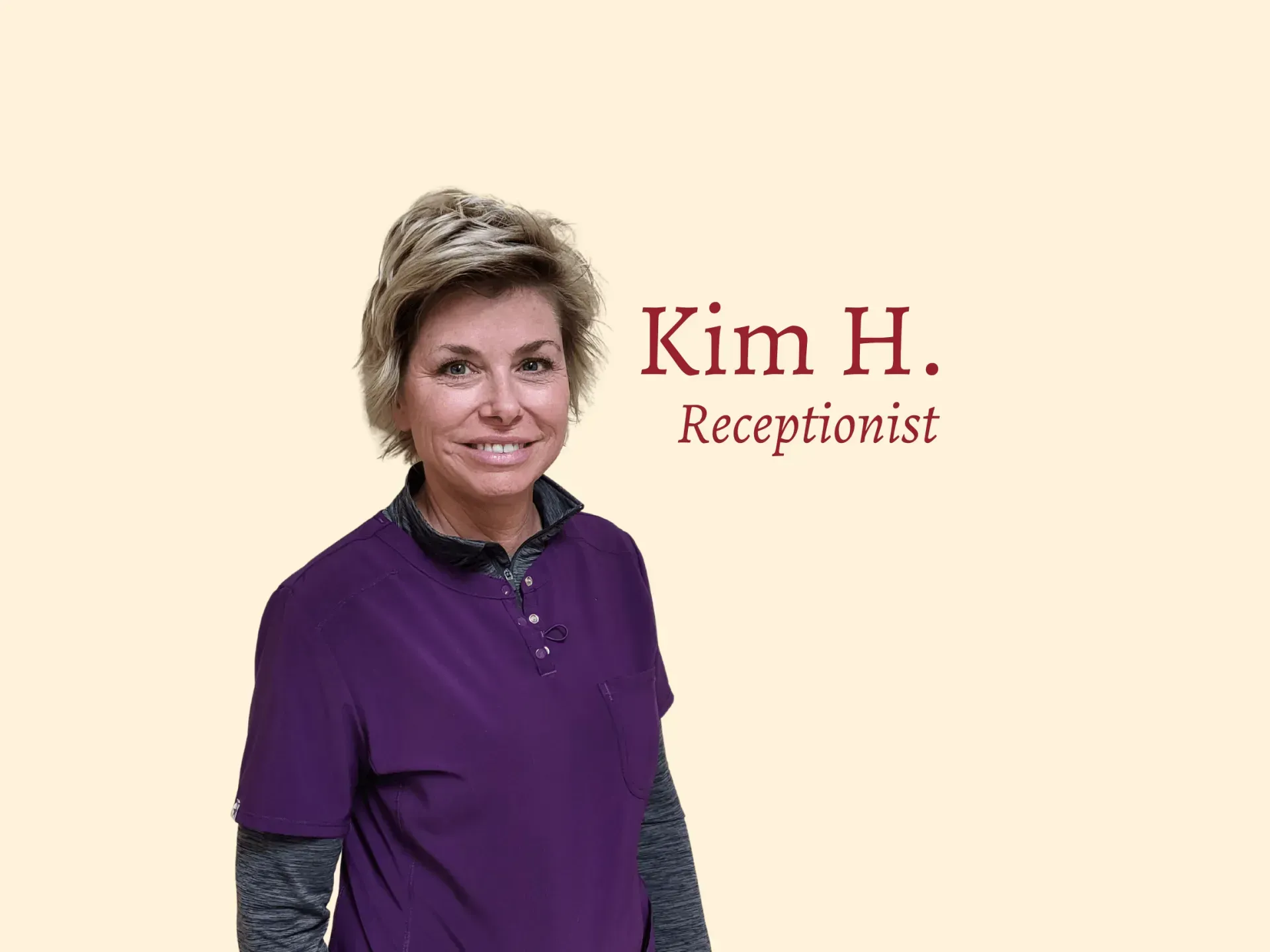 Kim H., receptionist, wearing purple shirt, smiling, against a light tan background.