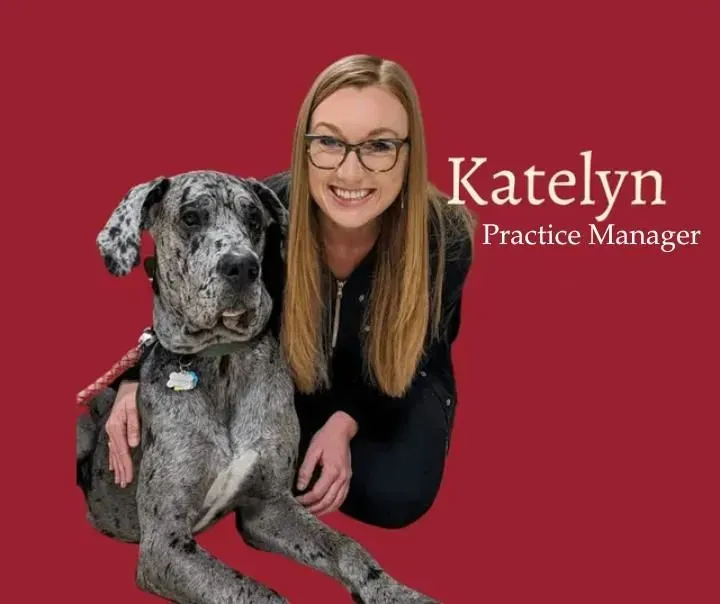 Woman with glasses and a large dog, labeled