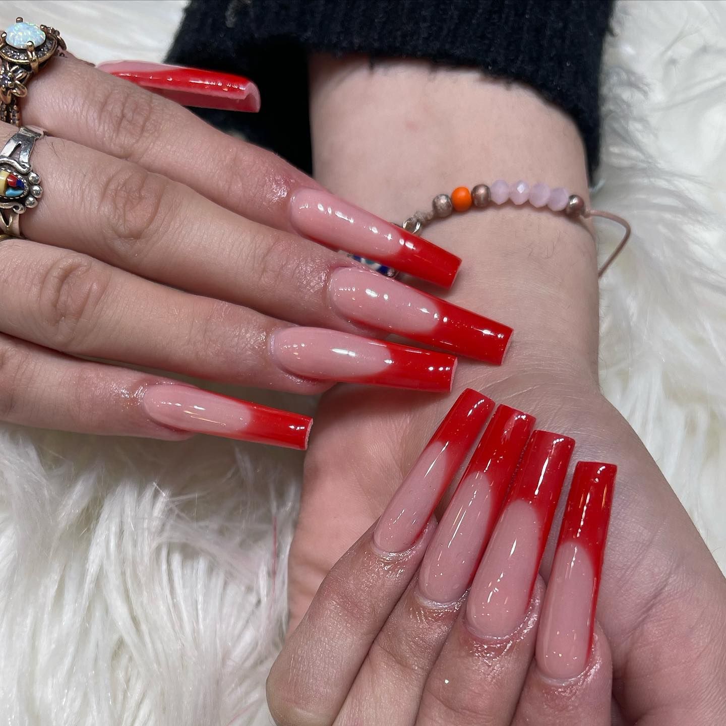A Person's Hands With Long Red Nails — San Diego, CA — Summer Nails and Spa A Person's Hands With Long Red Nails — San Diego, CA — Summer Nails and Spa