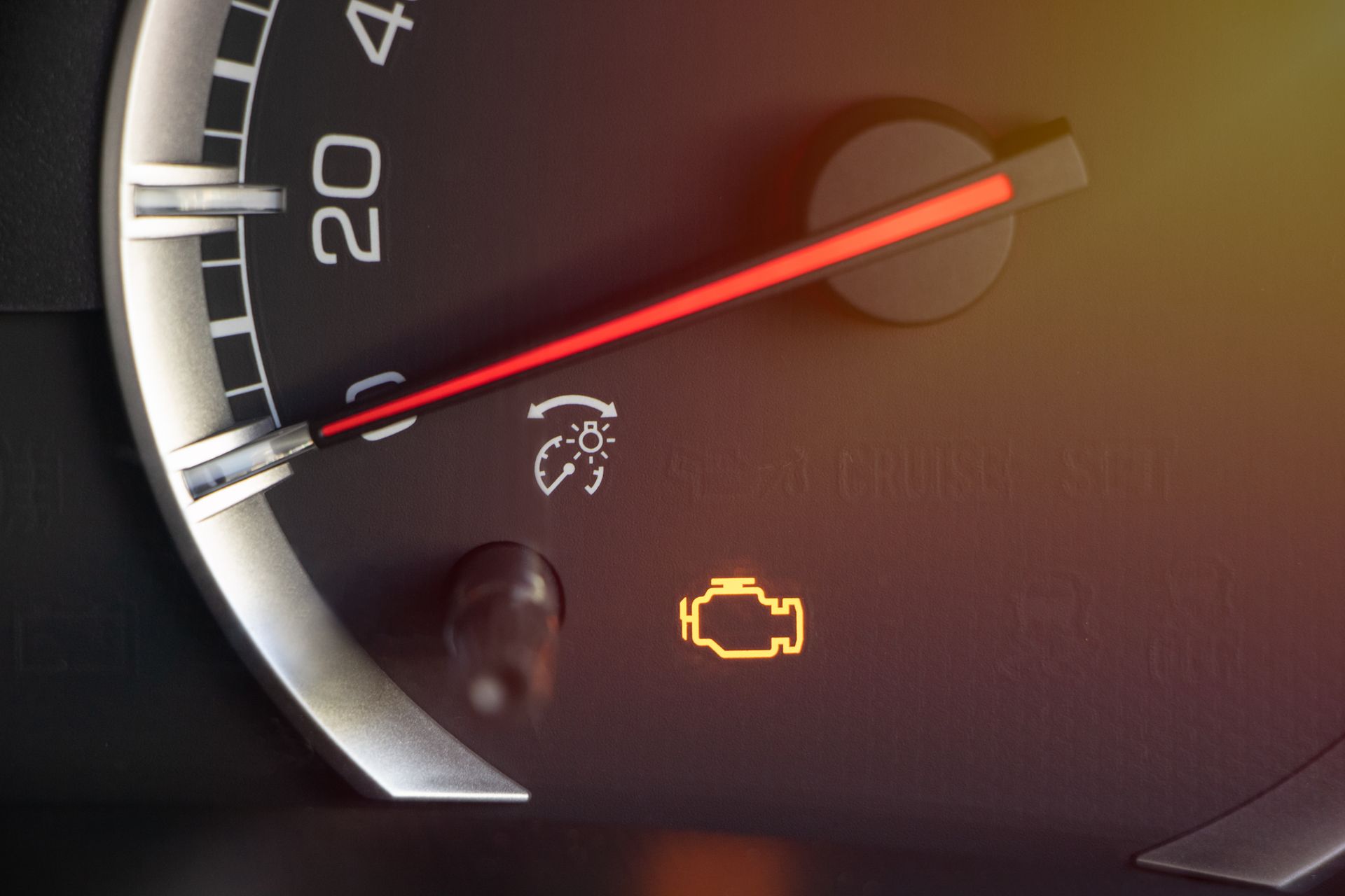 Dashboard showing the check engine light illuminated. | Space Center Automotive
