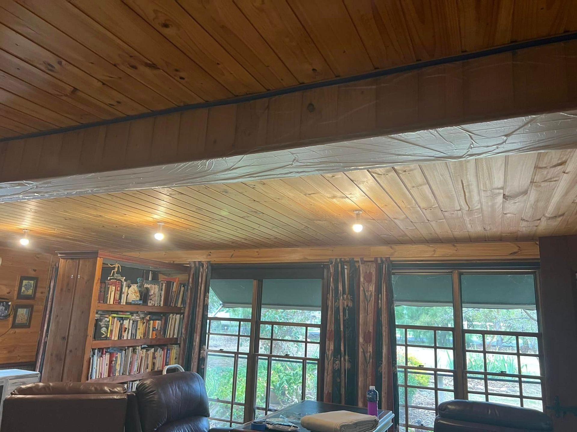 Cozy Wood Paneled Living Room — Matty Stewart Painting & Decorating in Mudgee, NSW
