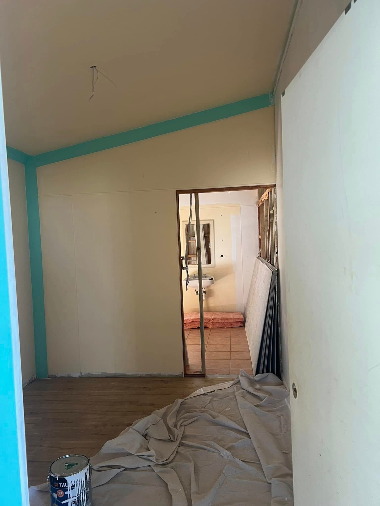 Narrow Room Under Renovation with Beige Walls — Matty Stewart Painting & Decorating in Mudgee, NSW